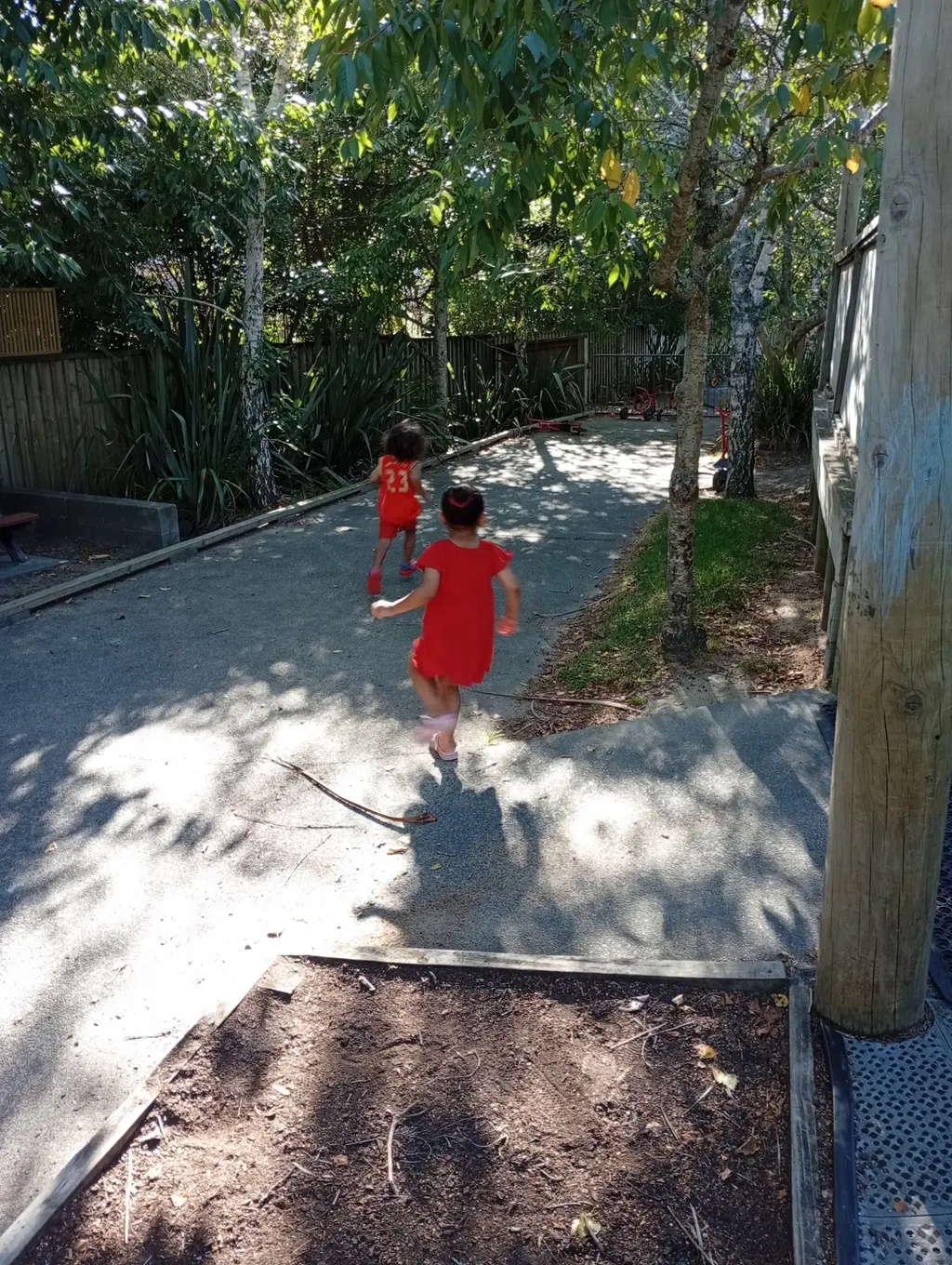 Child exploring the outdoor play space